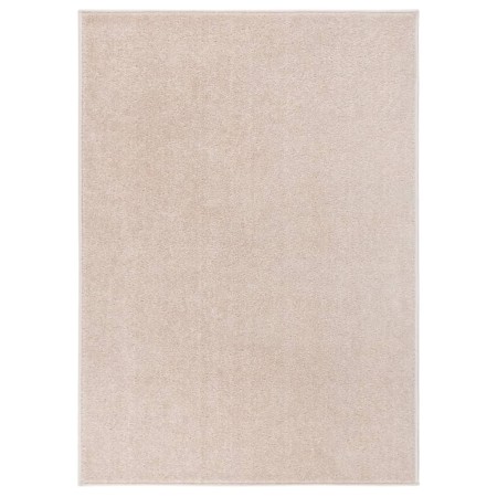 Alfombra de pelo corto beige oscuro 140x200 cm