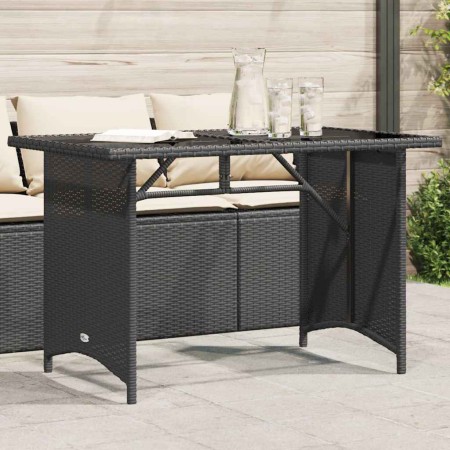 Mesa de jardín superficie de vidrio ratán PE negro 110x68x70 cm