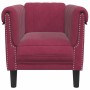 Sillón de terciopelo rojo tinto