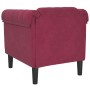 Sillón de terciopelo rojo tinto