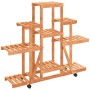 Soporte de flores con ruedas madera maciza abeto 110x25x101 cm