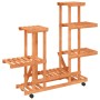 Soporte de flores con ruedas madera maciza abeto 95x25x101 cm