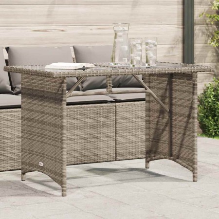 Mesa de jardín superficie de vidrio ratán PE gris 110x68x70 cm