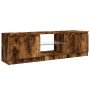Mueble de TV con luces LED roble ahumado 120x30x36 cm