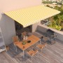 Toldo retráctil automático amarillo y blanco 600x350 cm