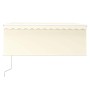 Toldo automático retráctil con persiana color crema 3x2,5m