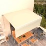 Toldo retráctil manual con persiana color crema 4x3 m