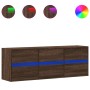 Mueble de TV de pared con luces LED marrón roble 130x31x45 cm