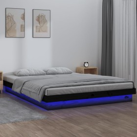 Estructura de cama con LED de madera maciza negra 140x200 cm