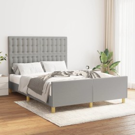 Estructura de cama con cabecero de tela gris claro