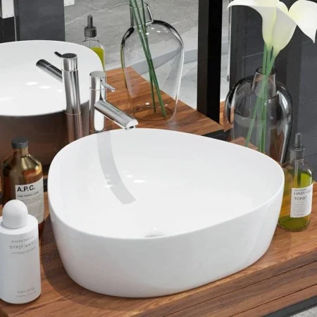 White ceramic triangular washbasin 50.5x41x12 cm by vidaXL, Sinks - Ref: Foro24-142345, Price: 65,35 €, Discount: %