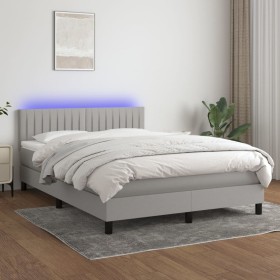 Cama box spring colchón y luces LED tela gris claro 140x200 cm