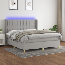 Cama box spring colchón y luces LED tela gris claro 160x200 cm