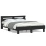 Bed frame with black engineered wood headboard 140x190 cm by , Beds and slatted bases - Ref: Foro24-3207435, Price: 171,02 €,...