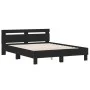 Bed frame with black engineered wood headboard 140x190 cm by , Beds and slatted bases - Ref: Foro24-3207435, Price: 171,26 €,...