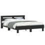 Bed frame with black engineered wood headboard 140x190 cm by , Beds and slatted bases - Ref: Foro24-3207435, Price: 171,02 €,...