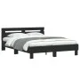 Bed frame with black engineered wood headboard 140x190 cm by , Beds and slatted bases - Ref: Foro24-3207435, Price: 171,26 €,...