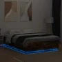 Bed frame with LED lights smoked oak wood 120x200 cm by , Beds and slatted bases - Ref: Foro24-3209622, Price: 161,27 €, Disc...