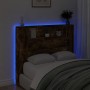 Cabecero de cama con luz LED roble ahumado 120x16,5x103,5 cm