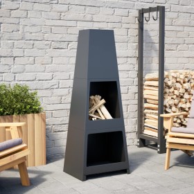 Chimenea de exterior con leñero y diseño de torre acero negro