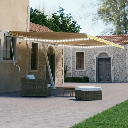 Manual retractable awning with yellow and white LED light 600x300 cm by vidaXL, Awnings - Ref: Foro24-3069603, Price: 640,65 ...