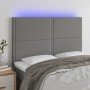Cabecero con luces LED tela gris oscuro 144x5x118/128 cm en Cabeceros y pies de cama | Comprar online en Foro24
