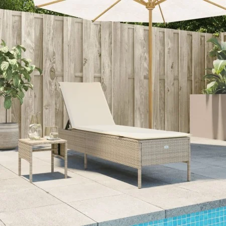 Sun lounger with cushion and synthetic beige rattan table by , Loungers - Ref: Foro24-4002732, Price: 172,21 €, Discount: %