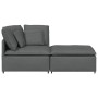 Sofá modular con reposapiés y cojines de tela gris oscuro