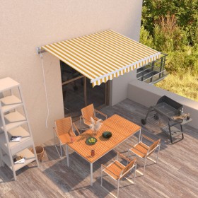 Toldo retráctil manual amarillo y blanco 350x250 cm