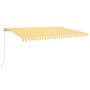 Toldo retráctil manual amarillo y blanco 500x300 cm