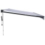 Toldo retráctil automático azul y blanco 5x3 m