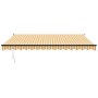 Toldo retráctil automático amarillo y blanco 4x3 m