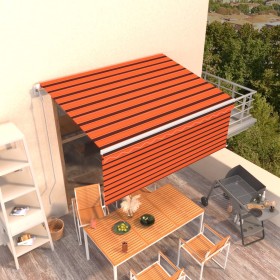 Toldo retráctil automático con persiana naranja y