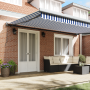 Toldo retráctil manual azul y blanco 500x300 cm