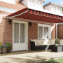 Toldo retráctil manual en naranja y marrón, 500x300 cm de , Toldos - Ref: Foro24-3331231, Precio: 600,73 €, Descuento: %