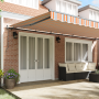 Toldo Retráctil Automático a Rayas Multicolor 600x300 cm