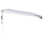 Toldo retráctil automático azul y blanco 5x3 m