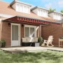 Toldo retráctil aluminio y tela naranja y marrón 4,5x3 m
