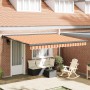 Toldo retráctil aluminio y tela amarillo y blanco 4x3 m