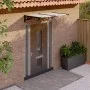 Black and transparent polycarbonate door canopy 152.5x90cm by vidaXL, Awnings - Ref: Foro24-153684, Price: 62,79 €, Discount: %