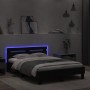 Estructura de cama con cabecero y luces LED negro 135x190 cm