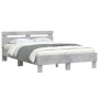 Estructura de cama cabecero y luces LED gris hormigón 135x190cm