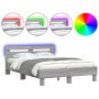 Estructura de cama cabecero y luces LED gris Sonoma 120x190 cm