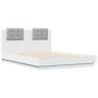 Estructura de cama con cabecero y luces LED blanco 140x190 cm