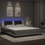 Estructura de cama con luz LED cuero PE blanco negro 180x200 cm