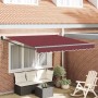 Toldo retráctil automático burdeos 300x250 cm
