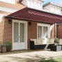 Toldo retráctil automático burdeos 300x250 cm