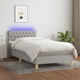 Cama box spring con colchón tela y LED gris claro 90x190 cm