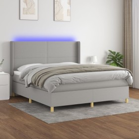 Cama box spring colchón y luces LED tela gris claro 160x200 cm