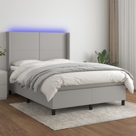 Cama box spring colchón y luces LED tela gris claro 140x200 cm